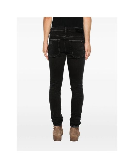 Amiri Black Distressed Skinny Jeans for men
