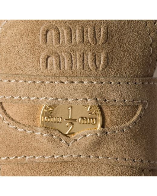 Miu Miu Natural Logo-Embossed Slip-On Mules
