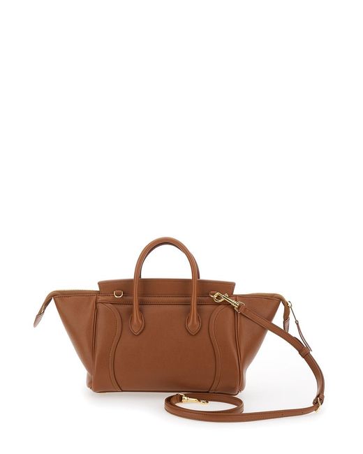 Céline Brown Handbag With Adjustable And Removable Shoulder Strap And Embossed Logo Lettering On The Front