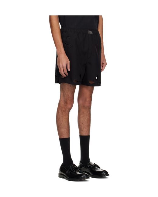 Coperni Black Petal Cut-Out Shorts for men