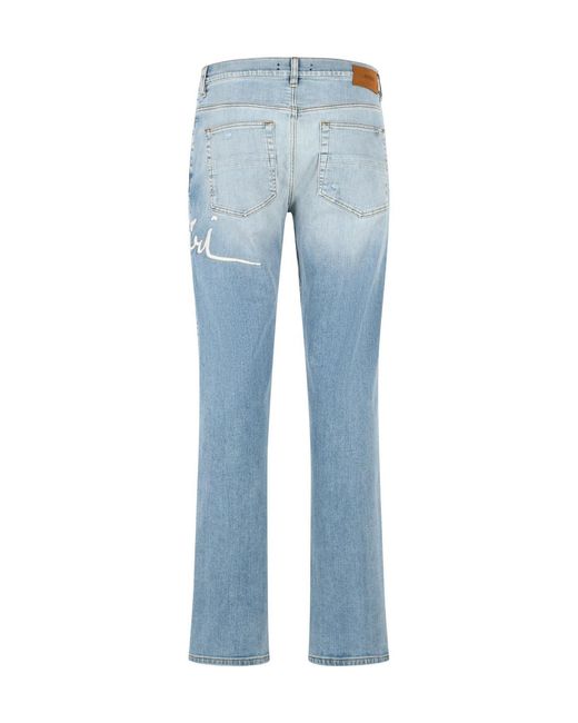 Amiri Blue Distressed Slim Jeans for men