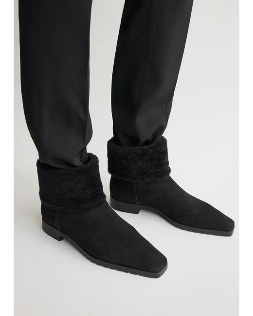 Totême  Black Fold-Down Shearling Boots
