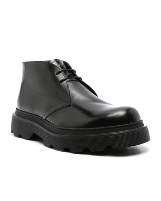 Tod's Black Round Toe Ankle Boots for men
