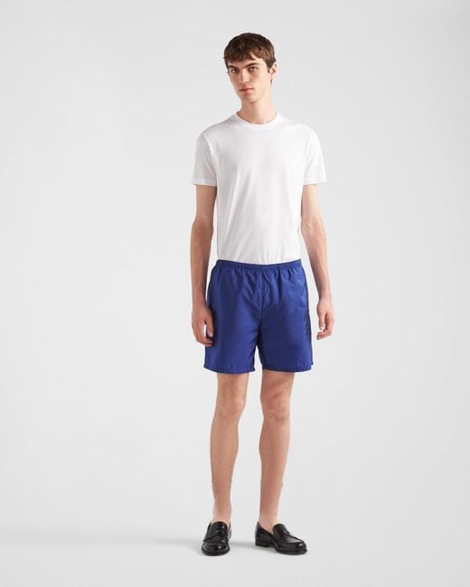 Prada Blue Logo Printed Swim Shorts for men