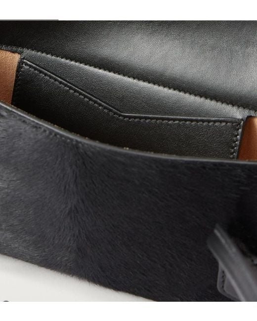Alaïa Black Alaïa Flap Strap Shoulder Bag