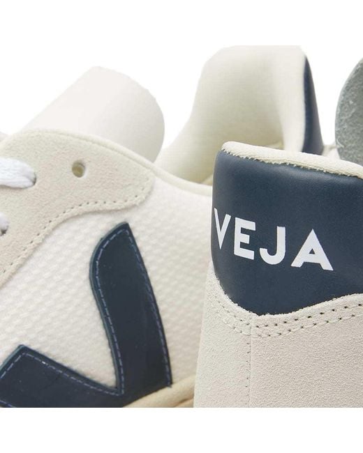 Veja White Logo Sports Shoes for men