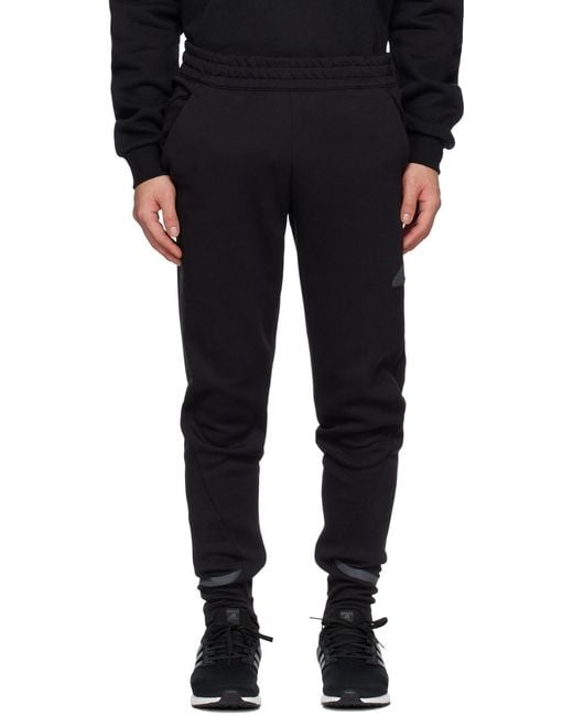 Adidas Originals Black Adidas Gameday Logo Patch Track Pants for men