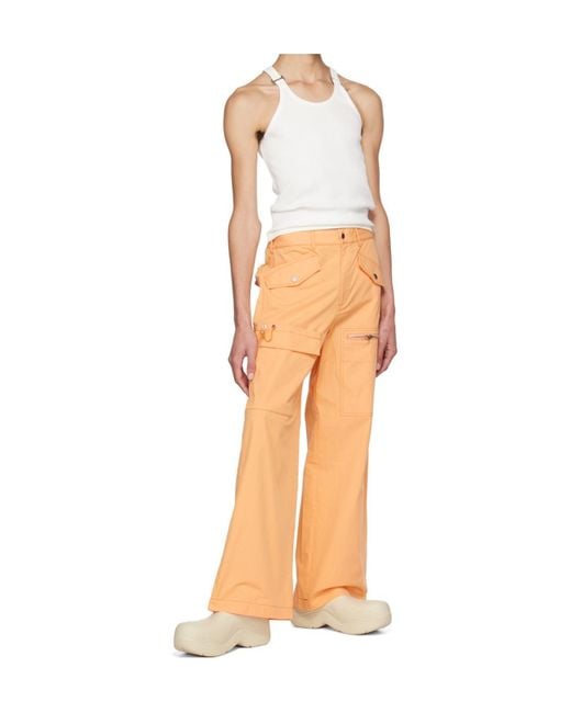 Dion Lee Orange Multi-Pocket Slouched Trousers for men