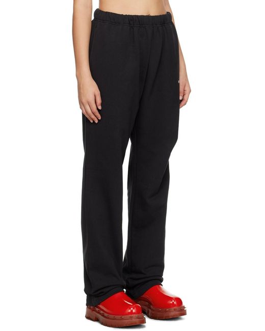 we11done Black Logo-Print Track Pants for men