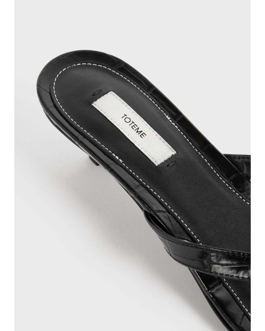 Totême White Totême Embossed Flip Flops