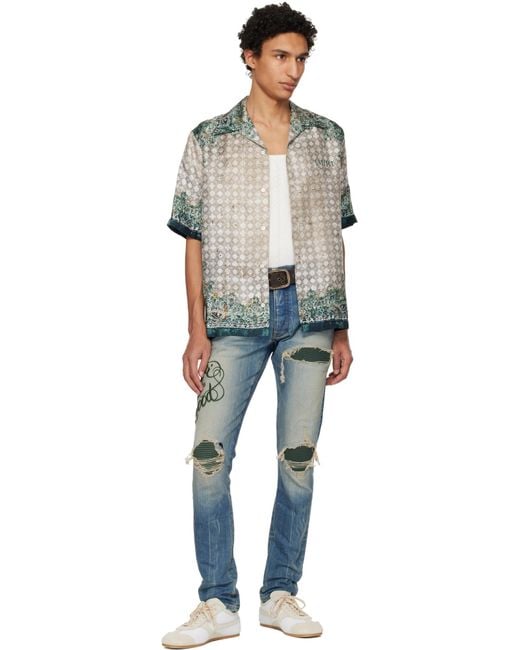 Amiri Blue Distressed Straight Leg Jeans for men