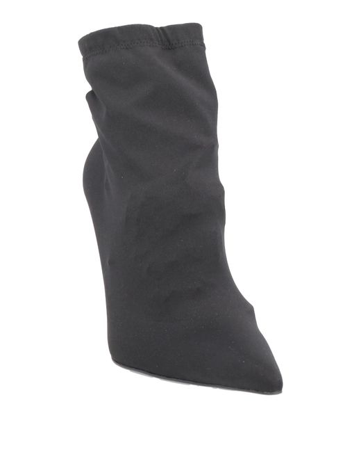 Dolce & Gabbana Black Solid Color Ankle Boots