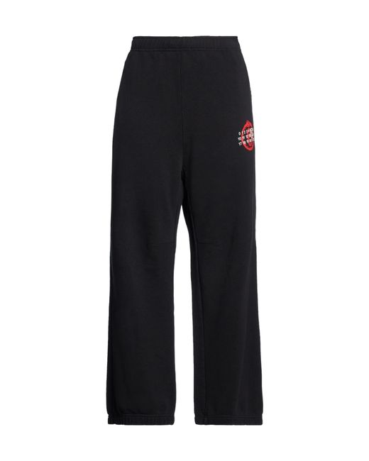 MM6 by Maison Margiela Black Solid Color Printed Casual Pants