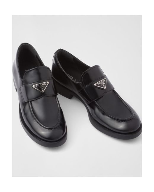 Prada Black Logo Plaque Almond-Toe Loafers
