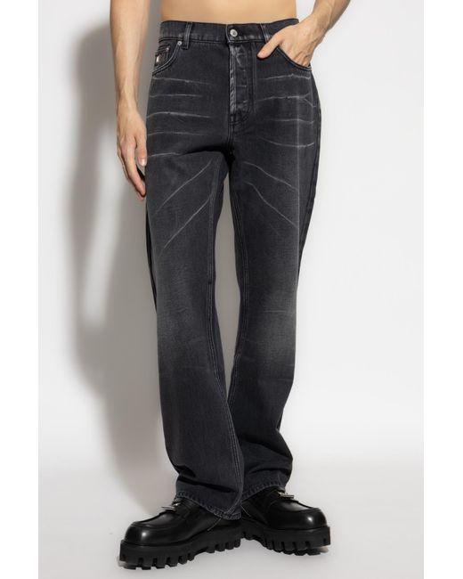 Moschino Blue Logo Patch Faded Jeans for men