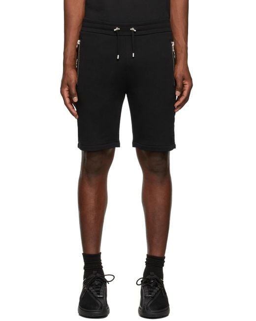 Balmain Black Logo Embossed Bermuda Shorts for men