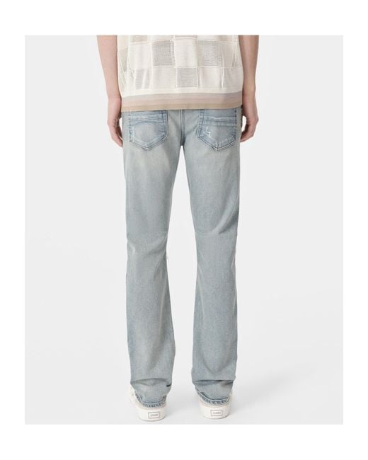 Amiri Blue Slash Jeans for men