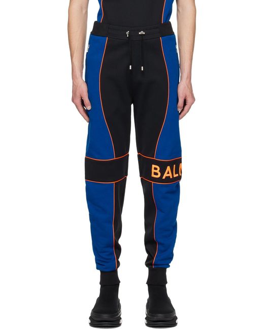 Balmain Blue Jogging Bottoms With Logo Inserts for men