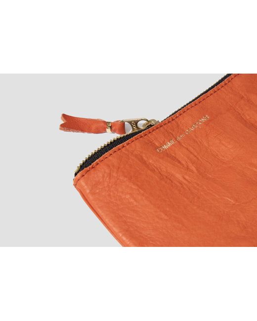 Comme des Garçons Orange Comme Des Garons Wallet Logo Printed Zip-Up Wallet for men