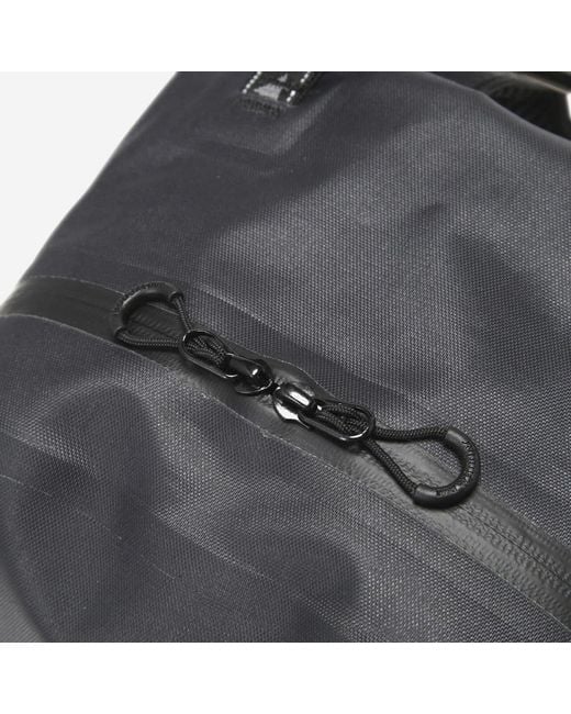And Wander Black Logo Printed Zipped Waterproof Backpack for men