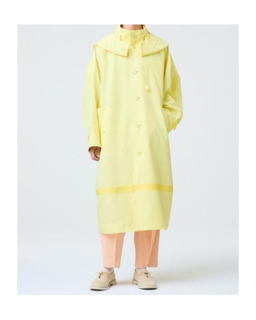 Homme Plissé Issey Miyake Yellow Carrier Carried Hooded Logo-Print Coat for men
