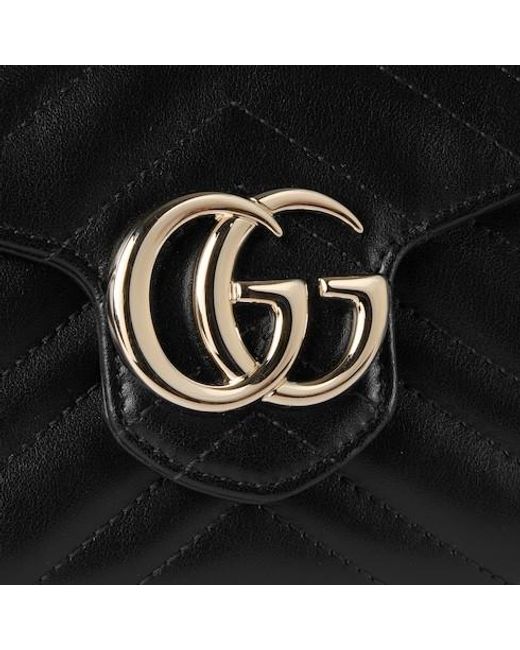 Gucci Black Logo Plaque Quilted Clutch Bag