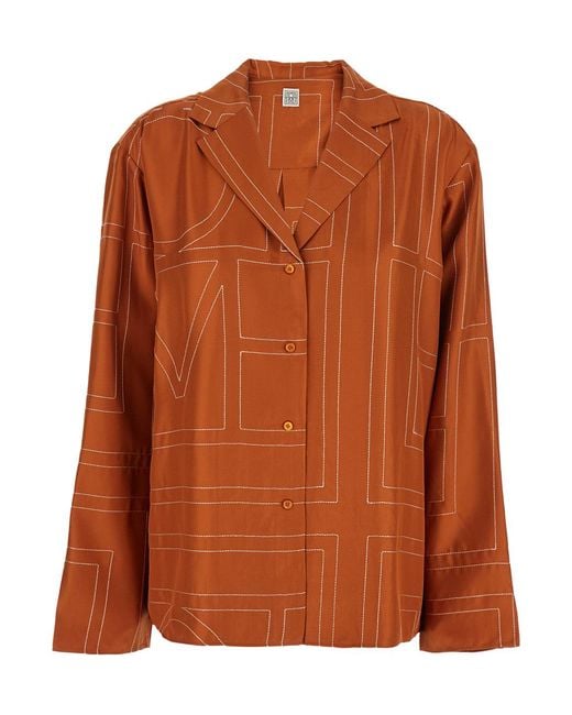 Totême Orange Shirt With Notched Collar And All-Over Logo Print