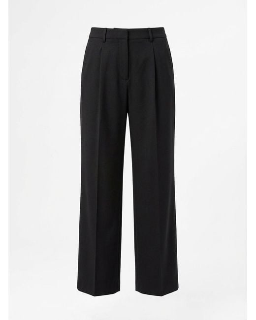 Gucci Black Logo Embossed Trousers