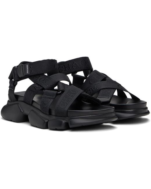 Undercover Black Cross-Strap Sandals