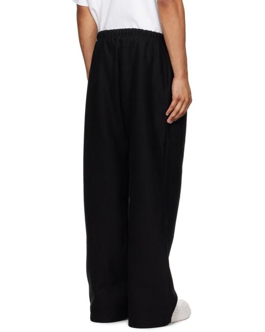 Alexander Wang Black Logo-Embossed Straight-Leg Track Pants for men