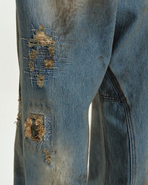 ANDERSSON BELL Blue Ripped Wide-Leg Jeans for men