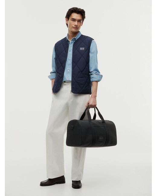 Tommy Hilfiger Black Logo-Patch Holdall Bag for men