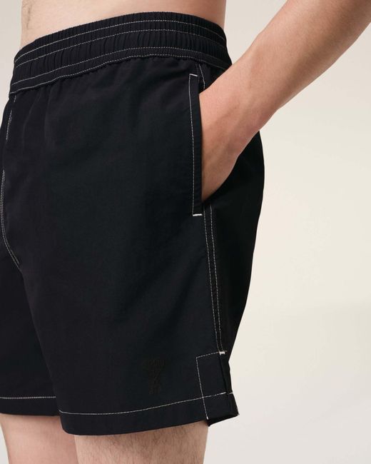AMI Black Logo Embroidered Swim Shorts for men