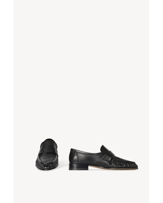 The Row Black Pleated Penny Flat Shoes