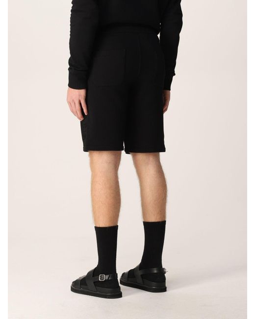 Balmain Black Logo Embossed Bermuda Shorts for men