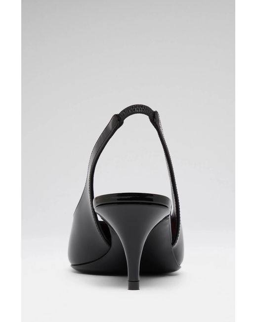 AMINA MUADDI Black Slingback Pumps