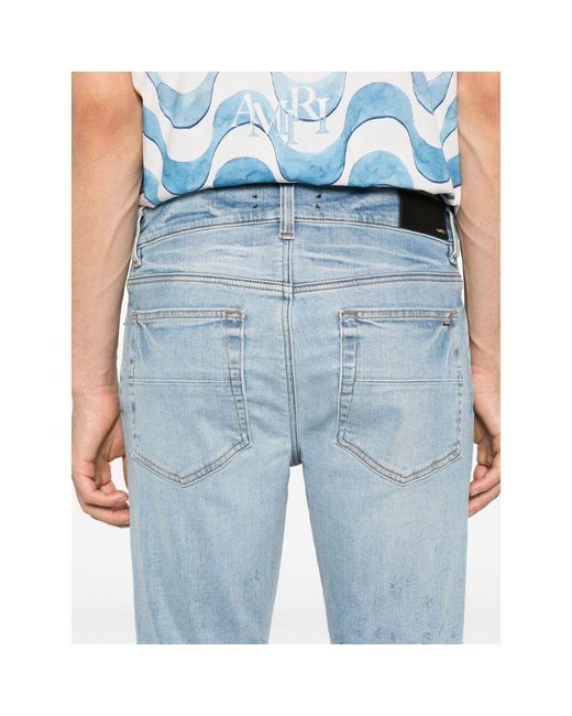 Amiri Blue Shotgun Ripped Skinny Jeans for men