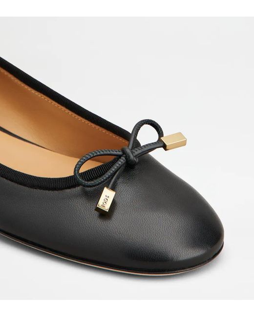 Tod's Black Round-Toed Ballet Shoes