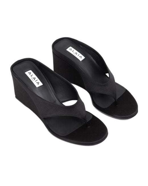 Alaïa Black Alaïa Wedge Thong Heeled Sandals