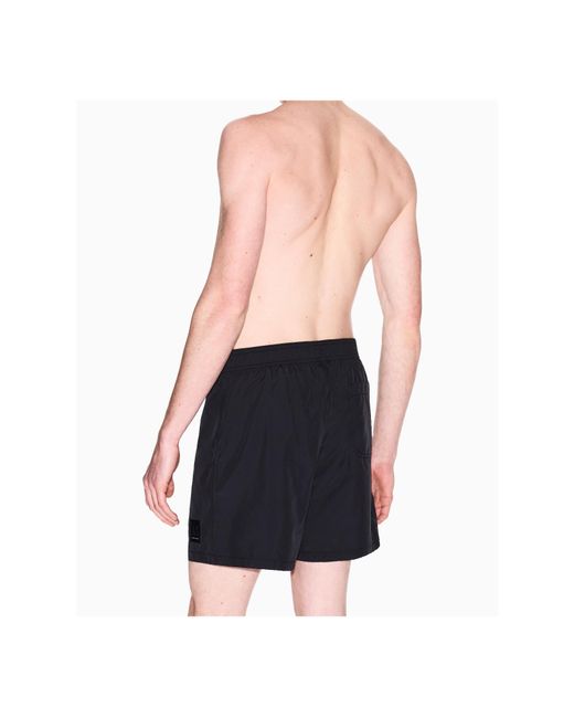 ARMANI EXCHANGE Black Logo-Patch Swim Shorts for men