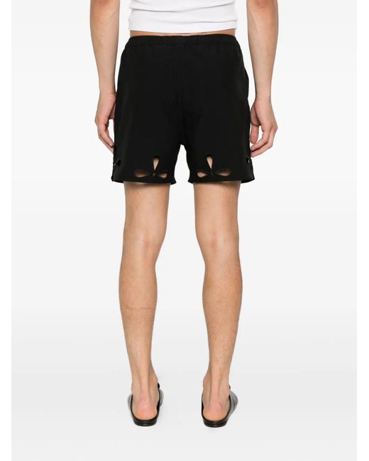 Coperni Black Petal Cut-Out Shorts for men