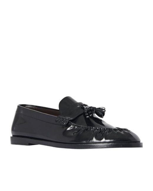 The Row Black Tassel Detailed Loafers