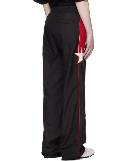 Amiri Black Star Panel Track Pants for men