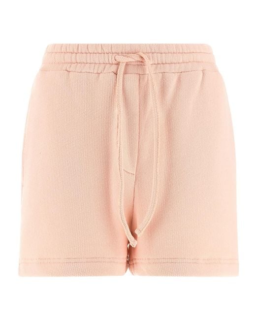 Dolce & Gabbana Pink Logo Patch Shorts
