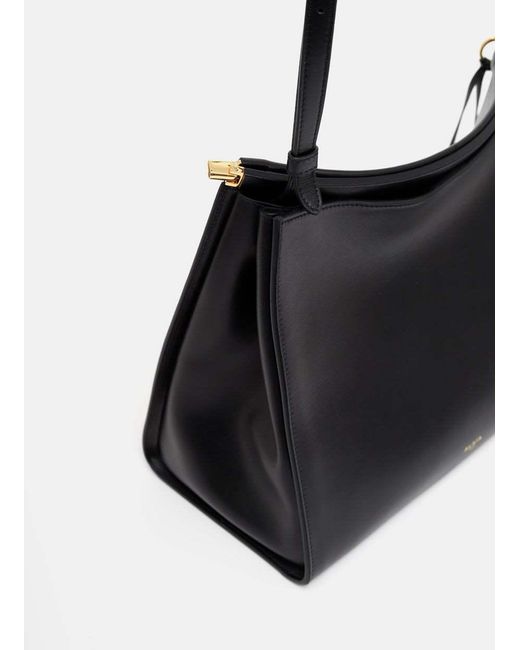 Alaïa Black Alaïa Logo Printed Zipped Shoulder Bag
