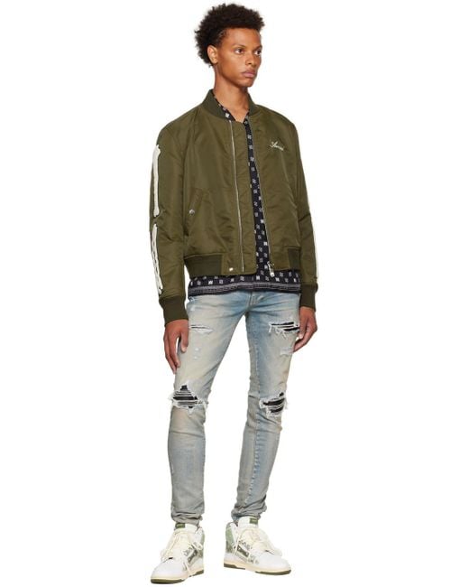 Amiri Blue Distressed-Finish Ripped Skinny Jeans for men