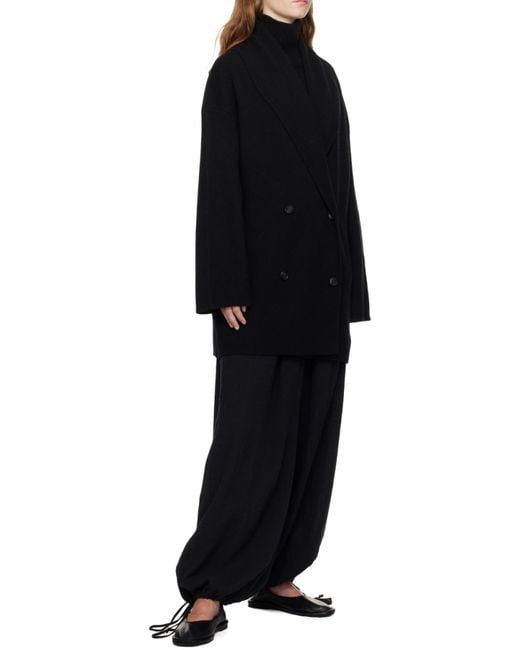 Lisa Yang Blue Turtleneck Sweater