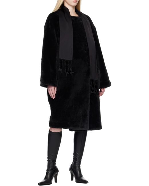 Totême  Black Collarless Shearling Coat
