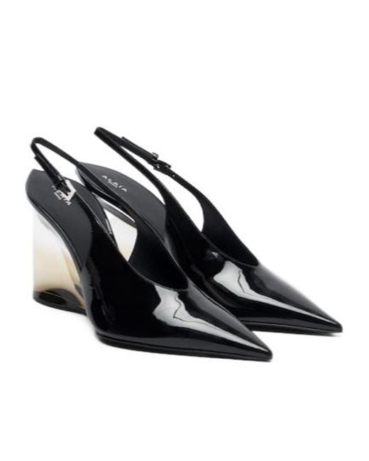 Alaïa Black Invisible Patent Leather Wedge Pumps