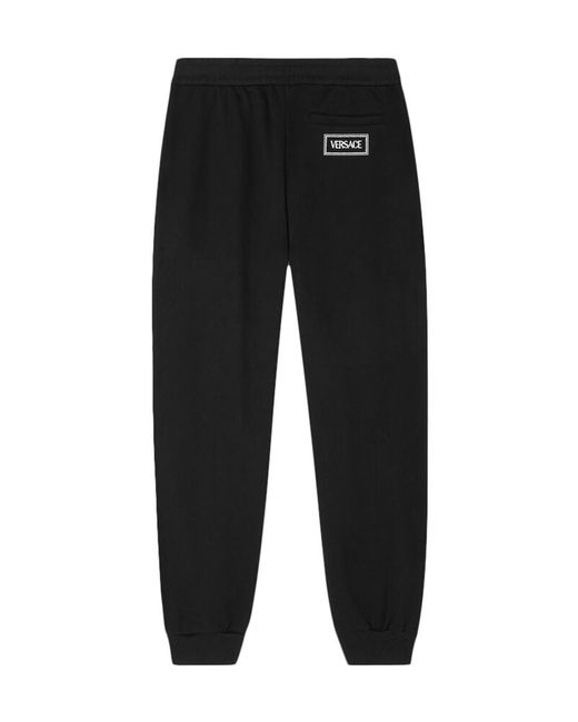 Versace Black Logo-Embroidered Elasticated Waistband Track Pants for men